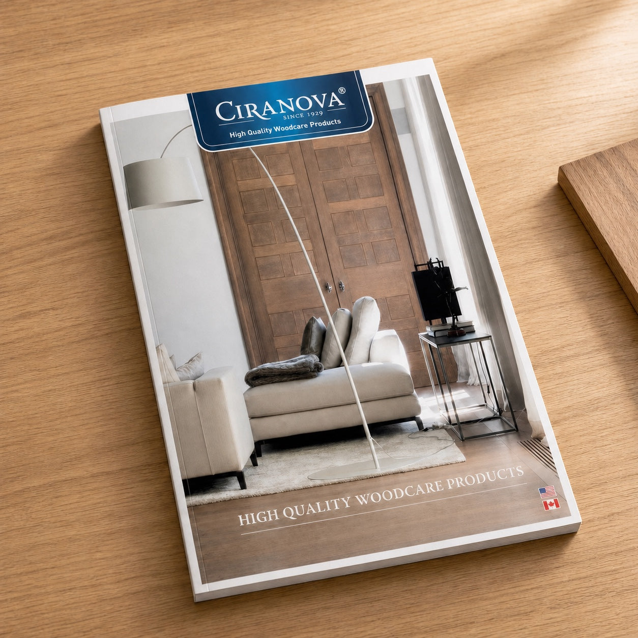 Ciranova USA catalog resting on a natural oak design desk
